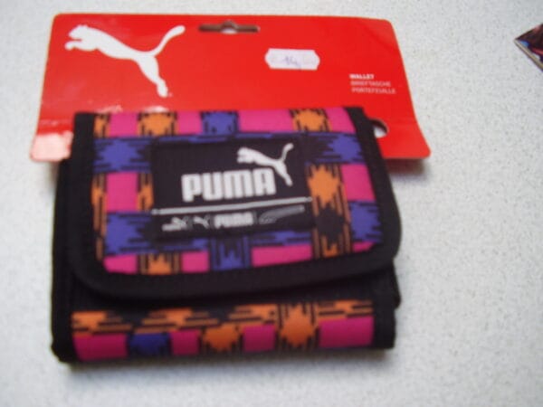Puma portefeuille 10.50x12.50cm vak voor kleine geld vak voor de kaart en vak briefjes