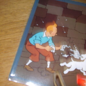 Kuifje schrift met lintjes